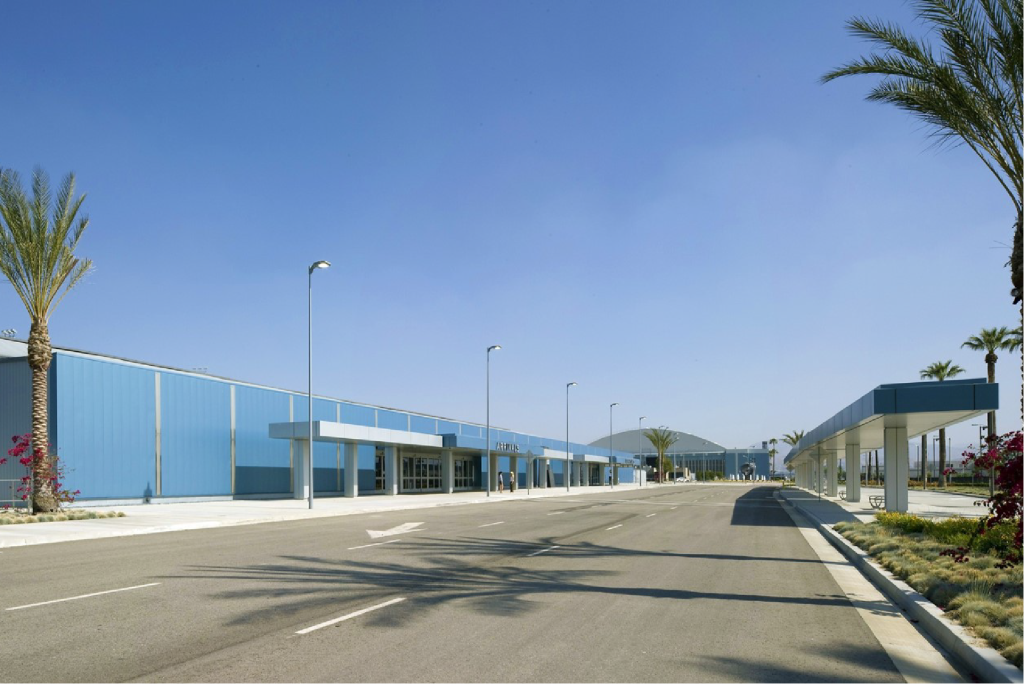 Palm tree lined street view of the domestic terminal and passenger pick up areas