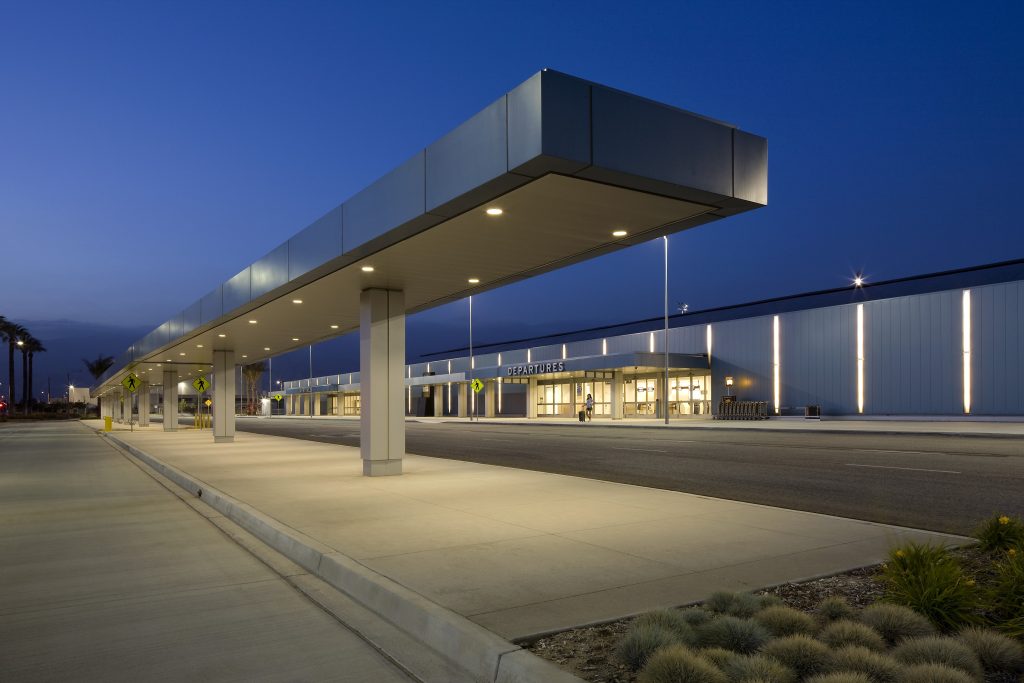 Nightime view of the passenger pik up areas and domestic terminal